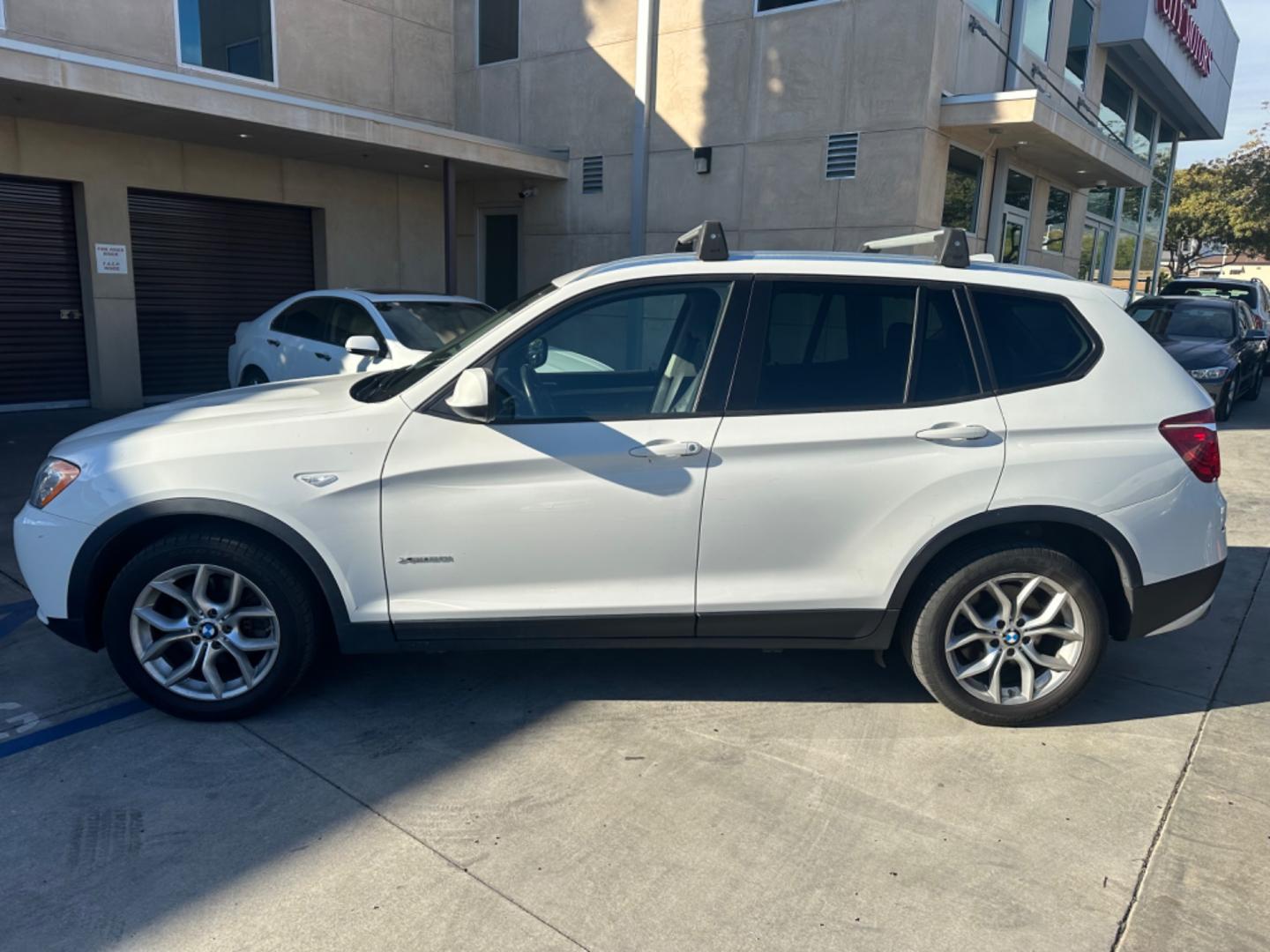 2013 WHITE BMW X3 xDrive28i (5UXWX9C52D0) with an 3.0L L6 DOHC 24V engine, 8-Speed Automatic transmission, located at 30 S. Berkeley Avenue, Pasadena, CA, 91107, (626) 248-7567, 34.145447, -118.109398 - Crown City Motors is a used “Buy Here Pay Here” car dealer in Pasadena CA. “Buy Here Pay Here” financing, means that when you purchase your vehicle from our dealership, that you make the payments to the dealership as well. We do not need the banks approval to get you approved for a used auto - Photo#1